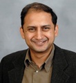 Overdose of foreign capital triggering rupee fall: Viral V Acharya