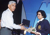 Vinod Rai, Director, Bank of Baroda                                    presenting an award for outstanding young achievers to Koneru Humpy, the renowned Indian Chess player