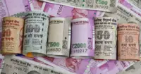 Rupee falls to 84.37 a dollar as foreign funds withdraw over $2.37 bn from Indian stocks in five days