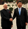 Xi, Modi talk trust, border issues with eye on trade