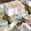 RBI lifts limits on deposits of banned notes